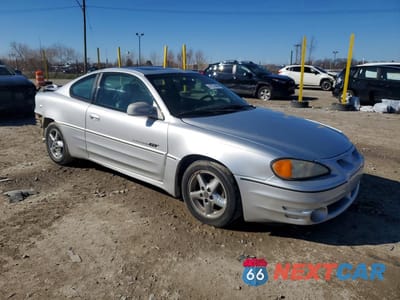 Czwarte zdjęcie samochodu z boku: 2001 PONTIAC GRAND AM GT1 VIN:1G2NV12E51M585128 - miniatura