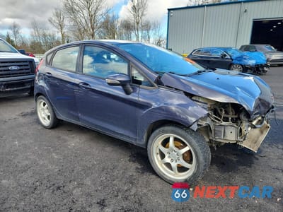 Czwarte zdjęcie samochodu z boku: 2012 FORD FIESTA SES VIN:3FADP4FJ4CM135168 - miniatura