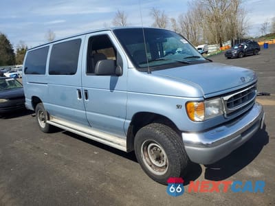 Czwarte zdjęcie samochodu z boku: 1998 FORD ECONOLINE E350 VIN:1FBNE31L2WHA01330 - miniatura