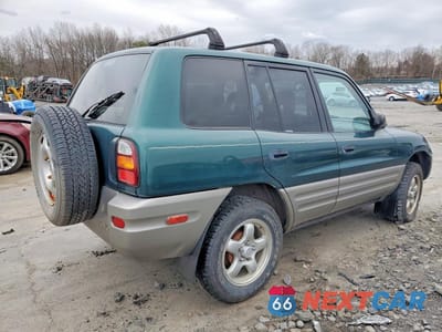 Trzecie zdjęcie samochodu z tyłu: 1998 TOYOTA RAV4 BASE VIN:JT3HP10V7W0187394 - miniatura