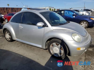 Czwarte zdjęcie samochodu z boku: 2001 VOLKSWAGEN NEW BEETLE GLS VIN:3VWCT21C31M405046 - miniatura