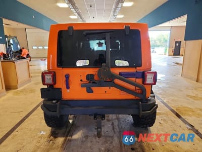 Zdjęcie 6 z 12 samochodu: 2012 JEEP WRANGLER UNLIMITED SPORT VIN:1C4BJWDG0CL244637 - miniatura