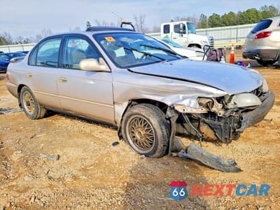 Czwarte zdjęcie samochodu z boku: 1997 TOYOTA COROLLA DX VIN:1NXBB02E9VZ596488 - miniatura