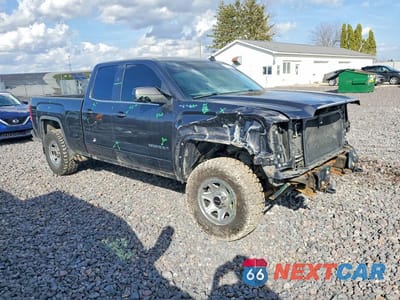 Czwarte zdjęcie samochodu z boku: 2014 GMC SIERRA K1500 SLE VIN:1GTV2UEC7EZ142679 - miniatura