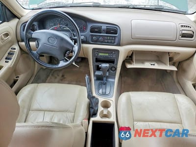Zdjęcie 8 z 11 samochodu: 1998 MAZDA 626 DX VIN:1YVGF22C8W5752888 - miniatura