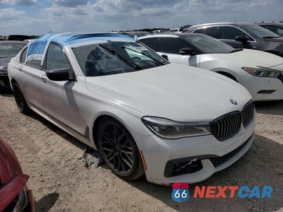 Czwarte zdjęcie samochodu z boku: 2019 BMW 750 XI VIN:WBA7F2C58KB239932 - miniatura
