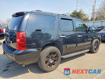 Trzecie zdjęcie samochodu z tyłu: 2011 CHEVROLET TAHOE K1500 LT VIN:1GNSKBE06BR186723 - miniatura