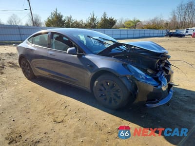 Czwarte zdjęcie samochodu z boku: 2023 TESLA MODEL 3 VIN:5YJ3E1EAXPF692494 - miniatura