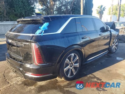 Trzecie zdjęcie samochodu z tyłu: 2025 CADILLAC ESCALADE IQ LUX-1 VIN:1GYTECKL0SU105778 - miniatura