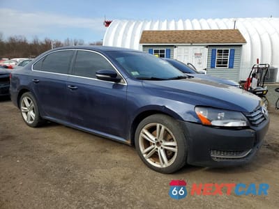 Czwarte zdjęcie samochodu z boku: 2014 VOLKSWAGEN PASSAT SE VIN:1VWBT7A38EC097470 - miniatura
