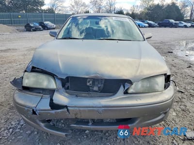 Piąte zdjęcie samochodu w środku: 1998 MAZDA 626 DX VIN:1YVGF22C8W5773403 - miniatura