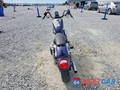 Czwarte zdjęcie samochodu z boku: 1999 HARLEY-DAVIDSON XL883 HUGGER VIN:1HD4CEM10XK116689 - miniatura