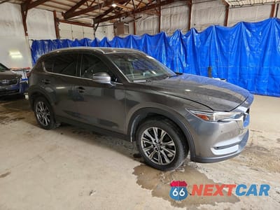 Czwarte zdjęcie samochodu z boku: 2019 MAZDA CX-5 SIGNATURE VIN:JM3KFBEY5K0615185 - miniatura