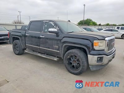Czwarte zdjęcie samochodu z boku: 2015 GMC SIERRA C1500 SLT VIN:3GTP1VEC2FG318380 - miniatura