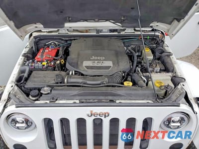 Zdjęcie 12 z 13 samochodu: 2013 JEEP WRANGLER UNLIMITED SAHARA VIN:1C4BJWEG8DL695038 - miniatura
