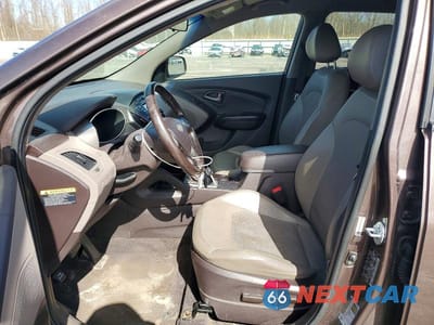 Zdjęcie 7 z 12 samochodu: 2015 HYUNDAI TUCSON SE VIN:KM8JUCAGXFU972112 - miniatura