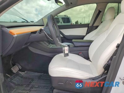Zdjęcie 7 z 12 samochodu: 2022 TESLA MODEL Y VIN:7SAYGDEE1NF447295 - miniatura