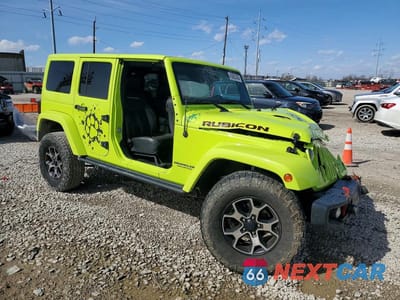 Czwarte zdjęcie samochodu z boku: 2016 JEEP WRANGLER UNLIMITED RUBICON VIN:1C4HJWFG6GL322836 - miniatura