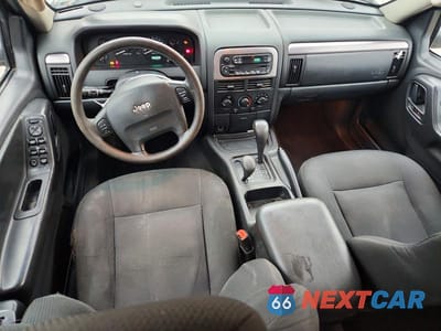 Zdjęcie 8 z 12 samochodu: 2002 JEEP GRAND CHEROKEE LAREDO VIN:1J4GW48S92C118408 - miniatura