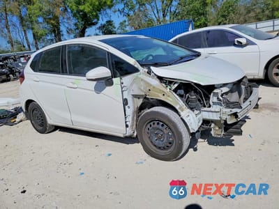 Czwarte zdjęcie samochodu z boku: 2018 HONDA FIT LX VIN:3HGGK5H49JM736058 - miniatura