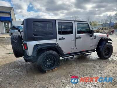 Trzecie zdjęcie samochodu z tyłu: 2015 JEEP WRANGLER UNLIMITED SPORT VIN:1C4BJWDG0FL742678 - miniatura