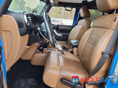 Zdjęcie 7 z 13 samochodu: 2011 JEEP WRANGLER UNLIMITED SAHARA VIN:1J4HA5H12BL632987 - miniatura