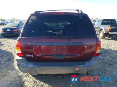 Zdjęcie 6 z 12 samochodu: 1999 JEEP GRAND CHEROKEE LAREDO VIN:1J4GW58S6XC784073 - miniatura