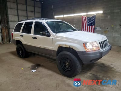 Czwarte zdjęcie samochodu z boku: 2004 JEEP GRAND CHEROKEE LAREDO VIN:1J4GW48S44C378346 - miniatura