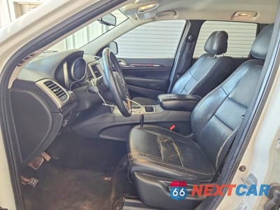 Zdjęcie 7 z 11 samochodu: 2012 JEEP GRAND CHEROKEE LAREDO VIN:1C4RJEAG3CC259436 - miniatura