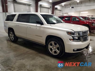 Czwarte zdjęcie samochodu z boku: 2015 CHEVROLET SUBURBAN K1500 LTZ VIN:1GNSKKKC5FR117512 - miniatura