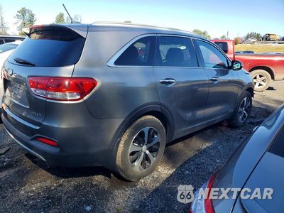 Trzecie zdjęcie samochodu z tyłu: 2016 KIA SORENTO EX V6 VIN:5XYPHDA54GG073059 - miniatura