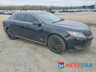 Czwarte zdjęcie samochodu z boku: 2014 LINCOLN MKS VIN:1LNHL9DKXEG612324 - miniatura