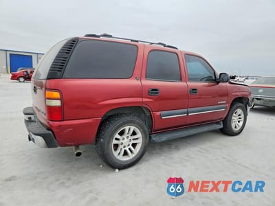 Trzecie zdjęcie samochodu z tyłu: 2002 CHEVROLET TAHOE C1500 VIN:1GNEC13V22R181571 - miniatura