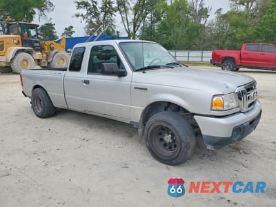 Czwarte zdjęcie samochodu z boku: 2011 FORD RANGER SUPER CAB VIN:1FTKR1EEXBPB19743 - miniatura