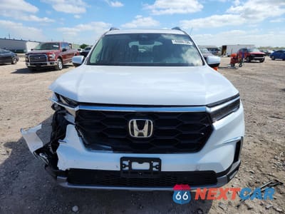 Piąte zdjęcie samochodu w środku: 2024 HONDA PILOT ELITE VIN:5FNYG1H80RB009634 - miniatura