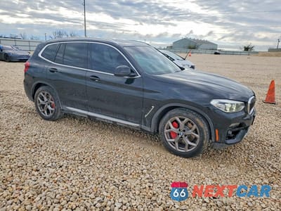 Czwarte zdjęcie samochodu z boku: 2021 BMW X3 SDRIVE30I VIN:5UXTY3C04M9H10220 - miniatura