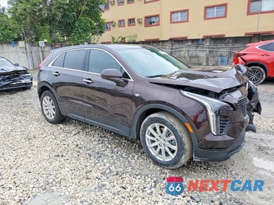 Czwarte zdjęcie samochodu z boku: 2021 CADILLAC XT4 LUXURY VIN:1GYAZAR46MF079970 - miniatura