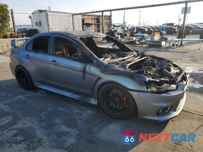 Czwarte zdjęcie samochodu z boku: 2015 MITSUBISHI LANCER EVOLUTION GSR VIN:JA32W8FV4FU026450 - miniatura