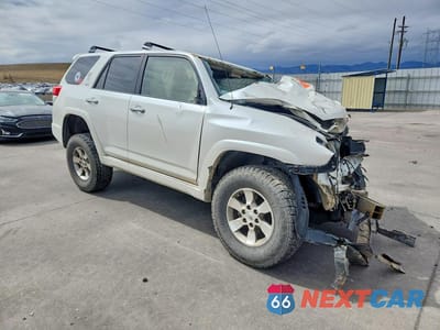 Czwarte zdjęcie samochodu z boku: 2010 TOYOTA 4RUNNER SR5 VIN:JTEZU5JR6A5003877 - miniatura