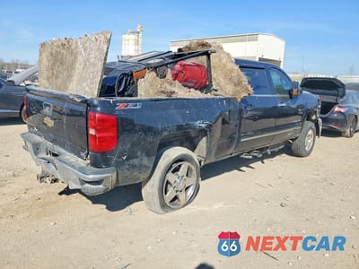 Trzecie zdjęcie samochodu z tyłu: 2015 CHEVROLET SILVERADO K2500 HEAVY DUTY LTZ VIN:1GC1KWE83FF568992 - miniatura