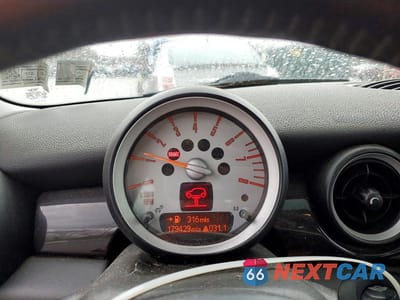 Zdjęcie 9 z 13 samochodu: 2007 MINI COOPER VIN:WMWMF33527TU61263 - miniatura