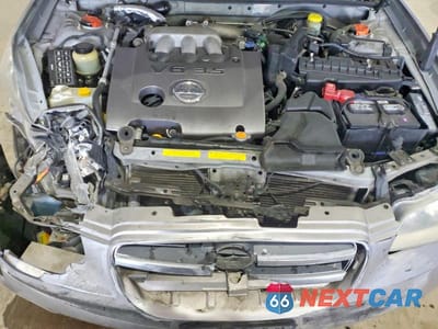 Zdjęcie 11 z 12 samochodu: 2002 NISSAN MAXIMA GXE VIN:JN1DA31D22T424785 - miniatura