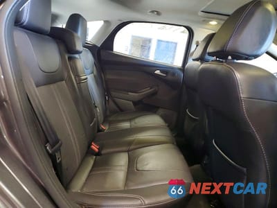 Zdjęcie 10 z 11 samochodu: 2013 FORD FOCUS TITANIUM VIN:1FADP3N23DL277115 - miniatura