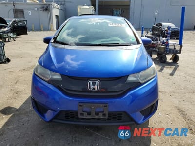 Piąte zdjęcie samochodu w środku: 2016 HONDA FIT LX VIN:JHMGK5H50GX020125 - miniatura