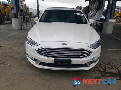 Piąte zdjęcie samochodu w środku: 2017 FORD FUSION TITANIUM PHEV VIN:3FA6P0SU0HR141965 - miniatura