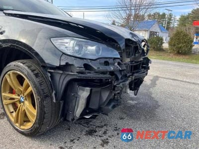Zdjęcie 12 z 12 samochodu: 2011 BMW X6 M VIN:5YMGZ0C57BLK14388 - miniatura