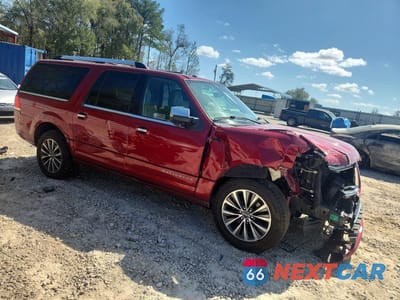 Czwarte zdjęcie samochodu z boku: 2015 LINCOLN NAVIGATOR L VIN:5LMJJ3HT2FEJ05242 - miniatura