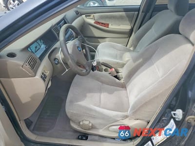 Zdjęcie 7 z 11 samochodu: 2004 TOYOTA COROLLA LE VIN:1NXBR32E24Z287585 - miniatura