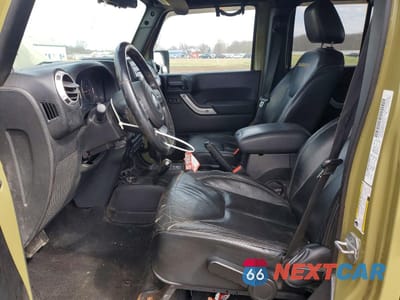 Zdjęcie 7 z 13 samochodu: 2013 JEEP WRANGLER UNLIMITED SAHARA VIN:1C4BJWEG8DL600722 - miniatura