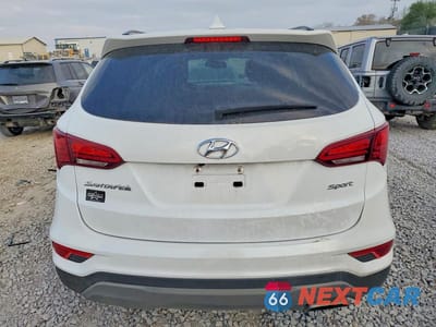 Zdjęcie 6 z 12 samochodu: 2018 HYUNDAI SANTA FE SPORT 2.4L VIN:5NMZU3LB1JH104931 - miniatura